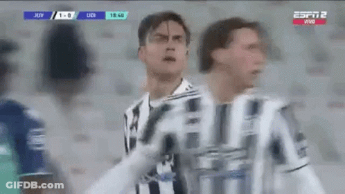 Soccer Players Standing On Field GIF