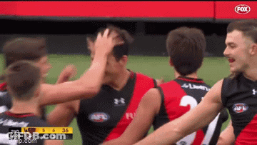 Soccer Players Standing On Field GIF
