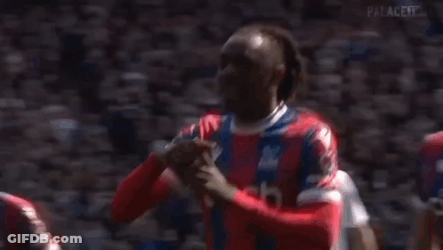 Soccer Players Standing On Field GIF