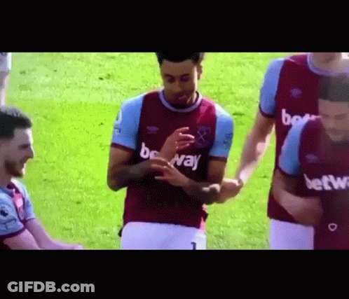 Soccer Players Standing On Field GIF