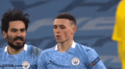 Soccer Players Standing On Field GIF