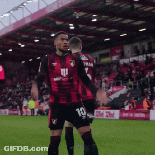 Soccer Players Standing On Field GIF