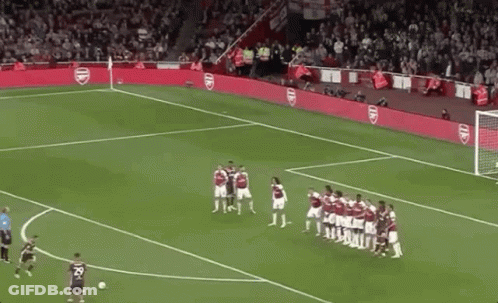 Soccer Players Standing With Arsenal Banner GIF
