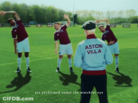 Soccer Players Stretching With Man In Aston Villa Jacket GIF