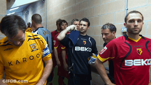 Soccer Players Wearing Beko Jerseys In Locker Room GIF