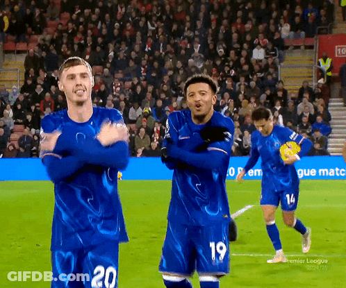 Soccer Players Wearing Blue Jerseys With The Number 20 On The Front GIF