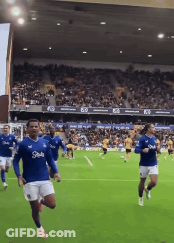 Soccer Players Wearing Stakes Shirts GIF