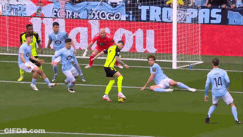 Soccer Players With Mahou Banner GIF