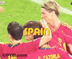 Soccer Players With Yellow Spain Letters GIF