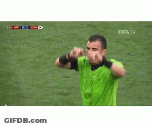 Soccer Referee In Green Shirt GIF