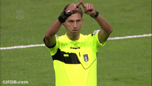 Soccer Referee In Yellow Shirt With Letter I GIF