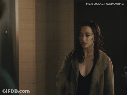 Social Reckoning Poster Woman Standing In Front Of Door GIF