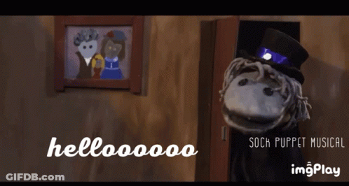 Sock Puppet Saying Hellooooo To Man And Woman GIF