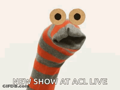 Sock Puppet With Big Eyes Making Funny Face GIF