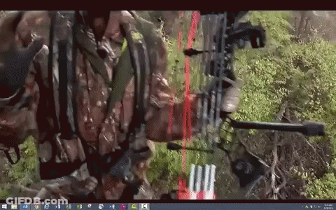 Soldier Holding Bow And Arrow On Computer Screen GIF