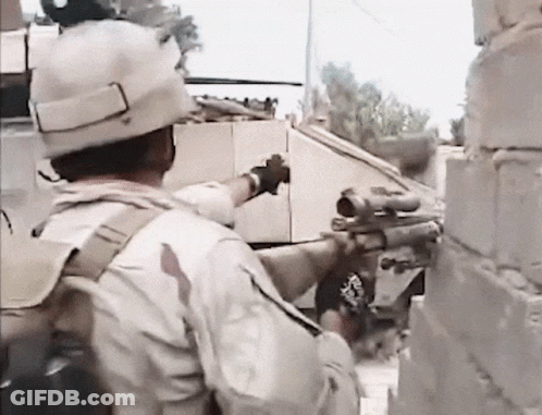 Soldier In Bandana Saying Army Holding Gun GIF