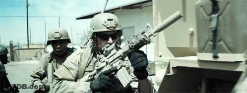 Soldier In Helmet Holding Gun GIF