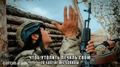 Soldier In Helmet Holding Gun Saying To Soothe My Sorrow GIF