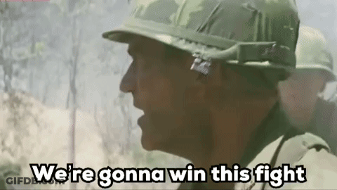 Soldier In Helmet Talking To Another Soldier GIF