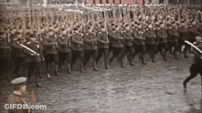 Soldier On Tank With Letter T GIF