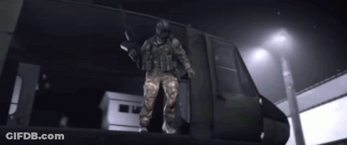 Soldier Riding Motorcycle On Top Of Vehicle GIF