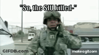 Soldier Talking On Cell Phone By White Van GIF