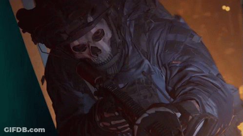 Soldier With Skull Mask Holding Gun GIF