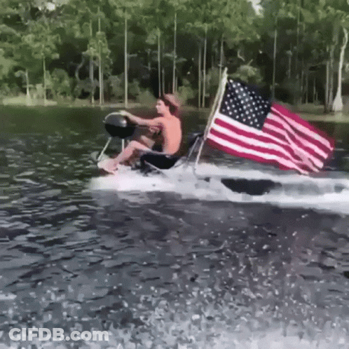 Soldiers Holding American Flag On Hill GIF