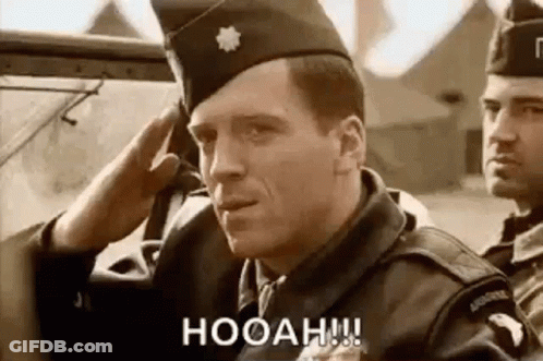 Soldiers In A Boat With Ship In Background GIF