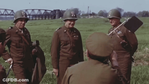 Soldiers In Field With S On Helmet GIF