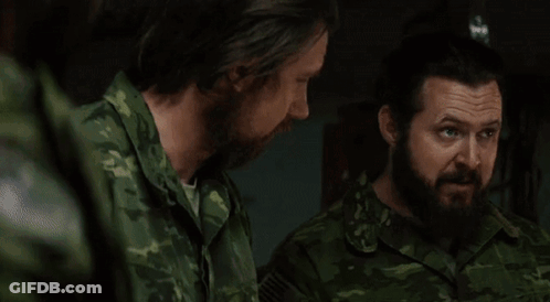 Soldiers Laughing, One With Name Tag Big GIF
