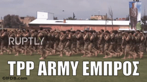 Soldiers Marching In Field With Ruptly Text GIF