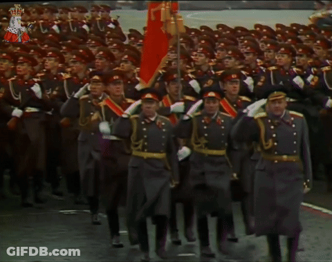Soldiers Marching In Parade With S Flag GIF