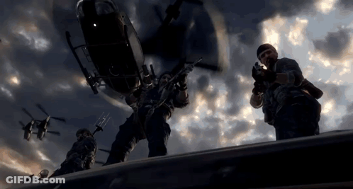 Soldiers On Building In Front Of Helicopter In Sky GIF
