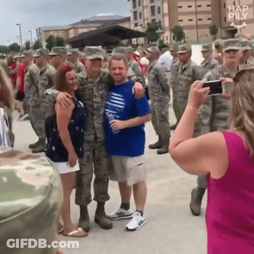 Soldiers Posing For Woman Photographer GIF