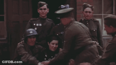 Soldiers Posing With U.S. Army Helmet GIF