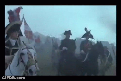 Soldiers Riding Horses In Field GIF