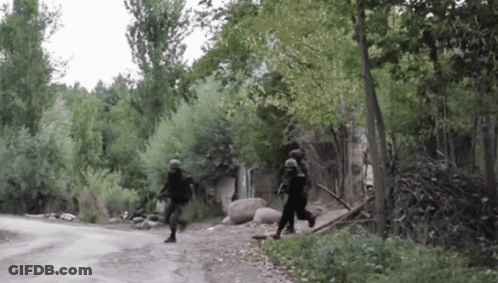 Soldiers Running Down Forest Road GIF