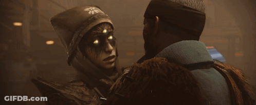 Soldiers Sitting Around Table With Lantern GIF