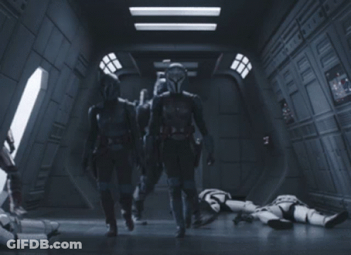 Soldiers Standing In Dark Hallway GIF