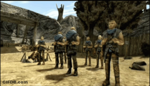Soldiers Standing In Desert Landscape GIF