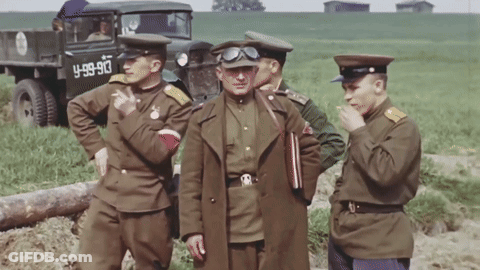 Soldiers Standing In Front Of Truck 4-99-913 GIF