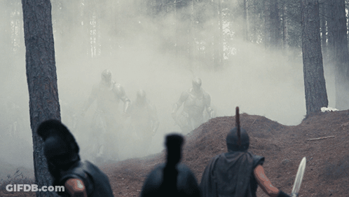 Soldiers Standing In Woods With Smoke GIF