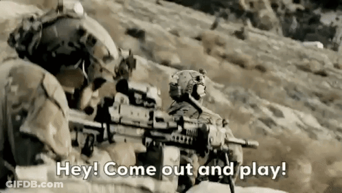 Soldiers Standing On Hill Holding Guns GIF