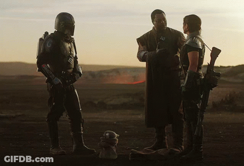 Soldiers Talking In Desert With Teddy Bear GIF