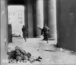 Soldiers Walking Through Tunnel GIF