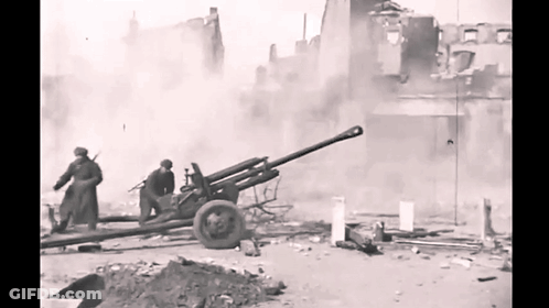 Soldiers With Cannon In Black And White GIF