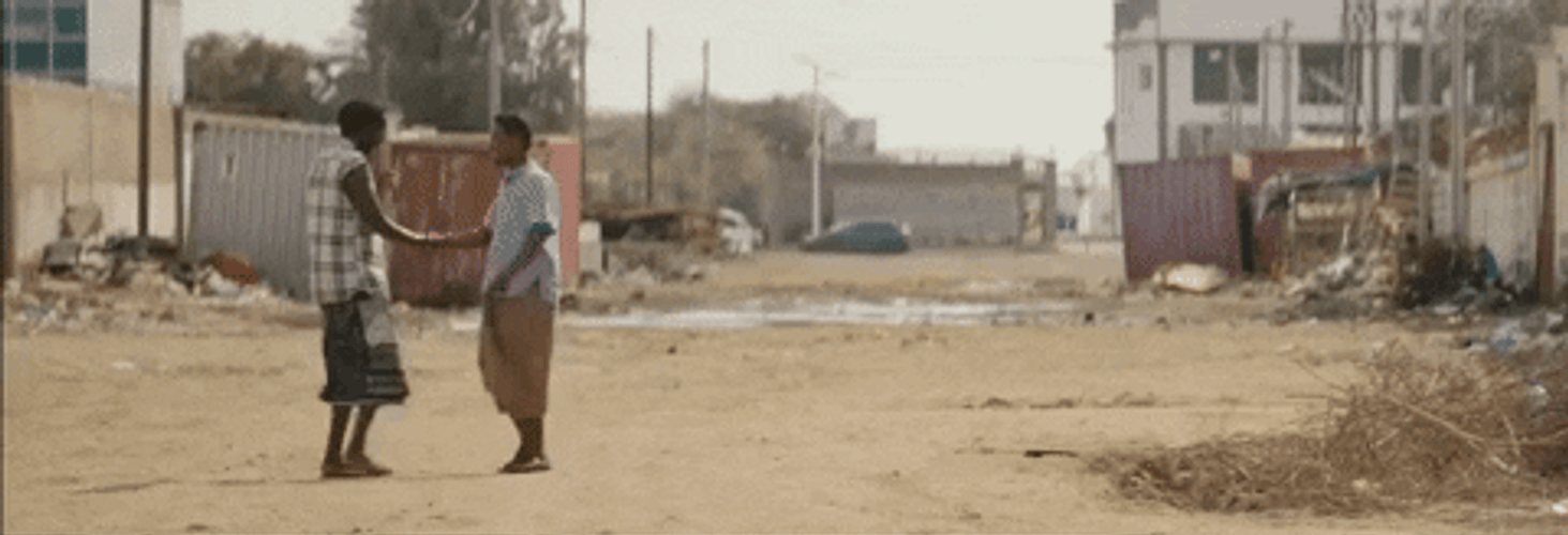 Somalia Men Hugging GIF