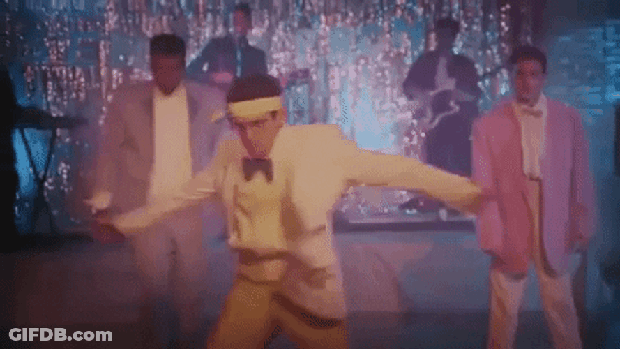Someone Dancing And Spinning Wearing Yellow Tux GIF