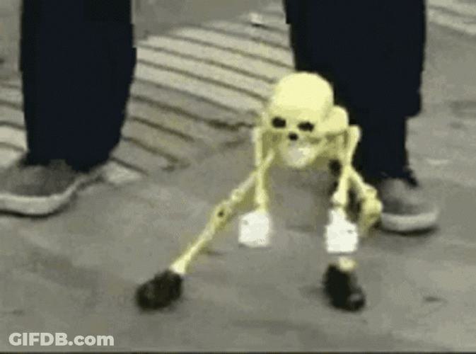 Someone Dancing Skeleton With Gloves And Shoes GIF